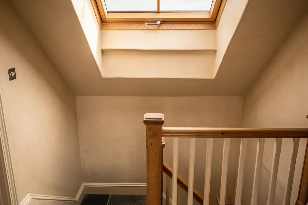 Inside a listed house: a conservation rooflight above a stair